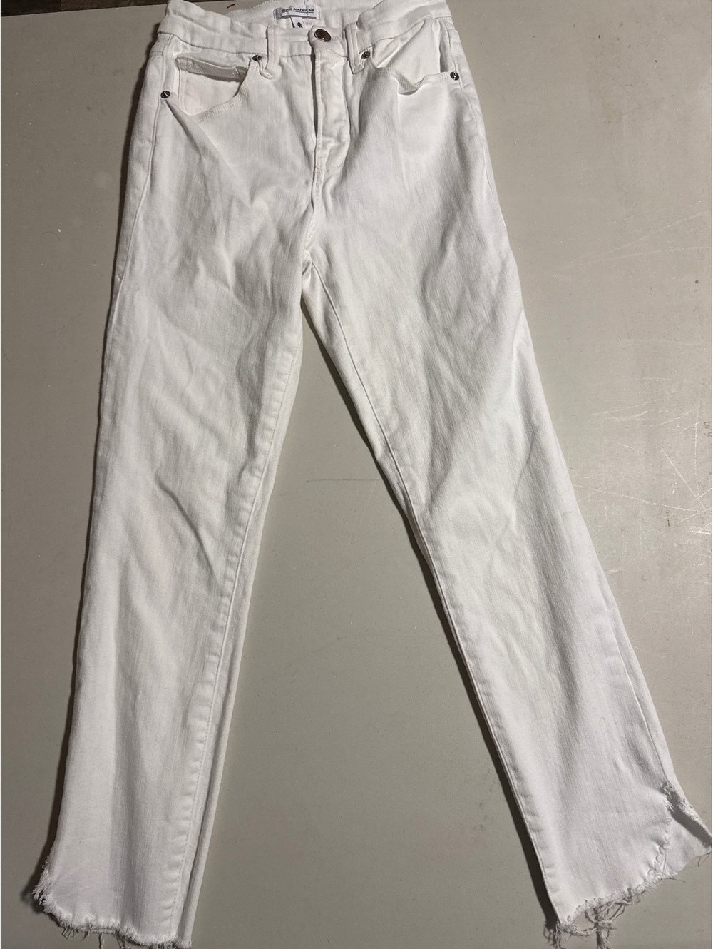 Good American White High-Waisted Skinny Jeans with Raw Hem